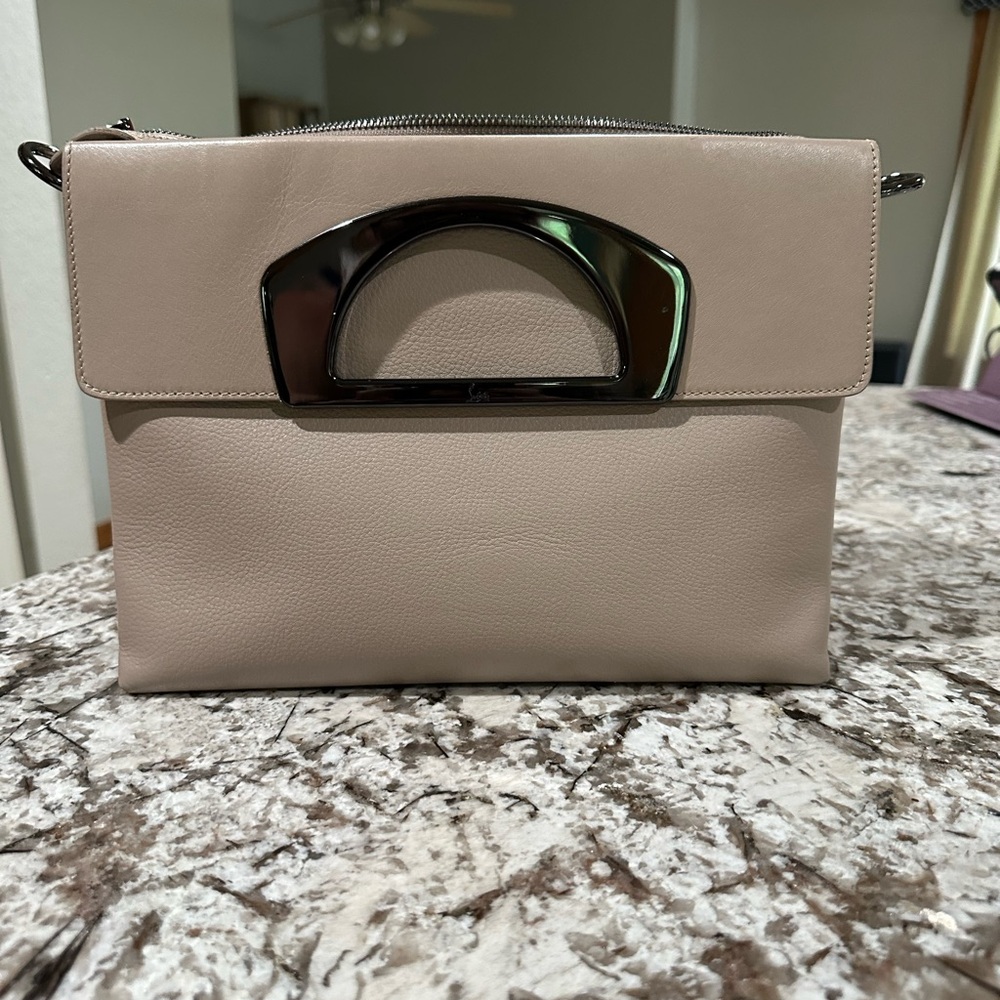 Christian Louboutin Tan Clutch with Sophisticated Design